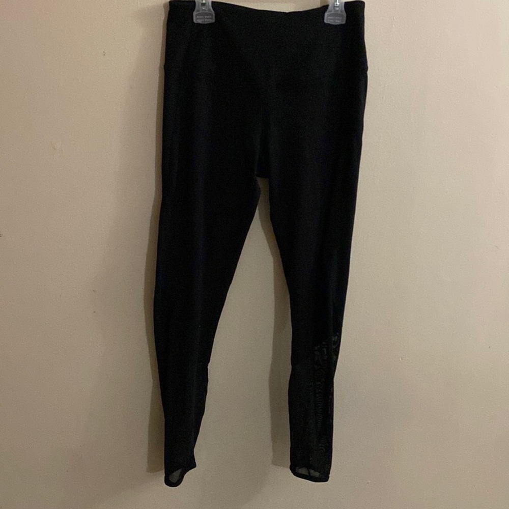 Black leggings with see through material on bottoms